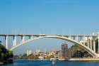 Arrabida Bridge (Ponte da Arrabida) over the Douro River, Porto, Portugal. Art Print